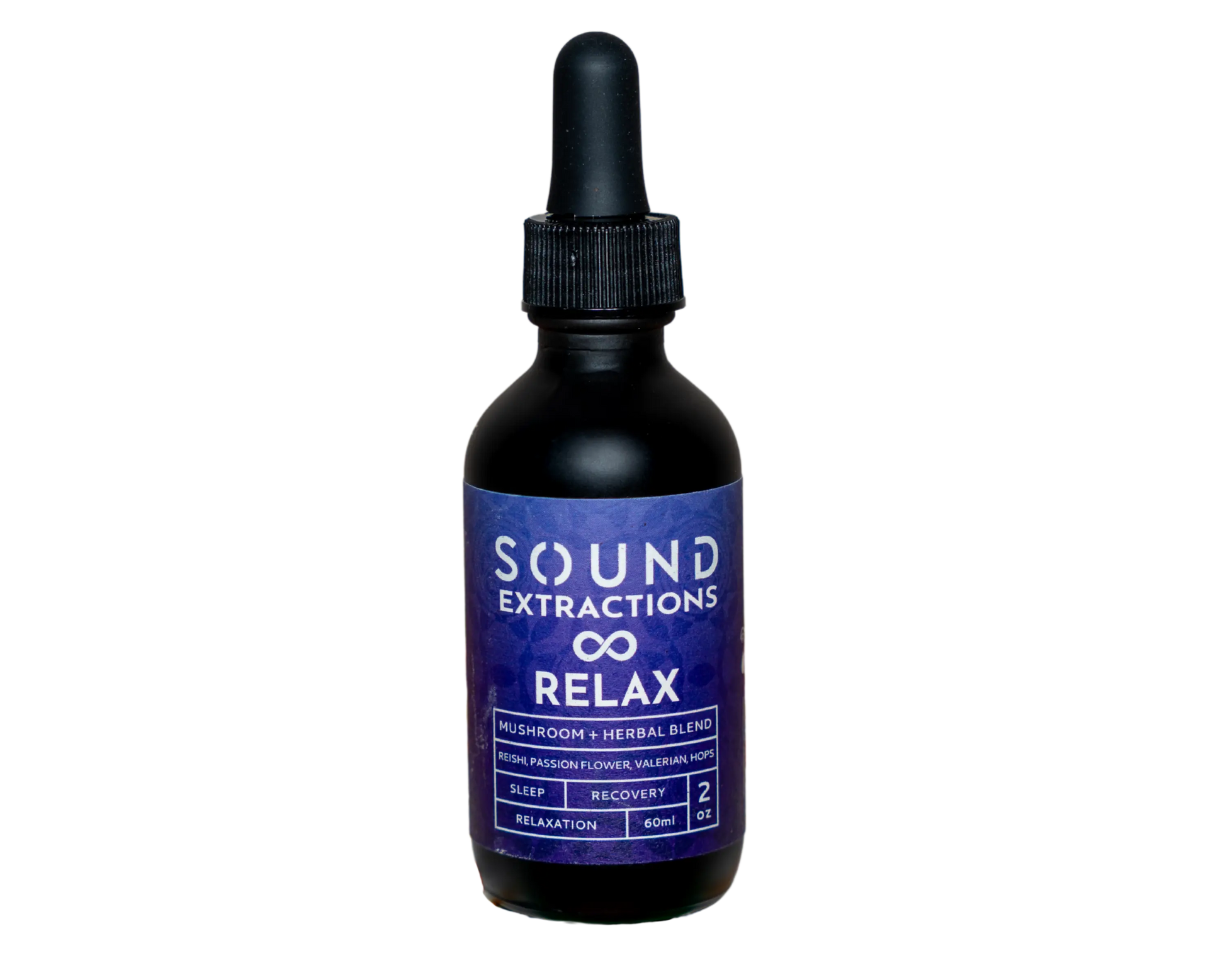 60ml dropper of Relax Blend in a calm natural setting